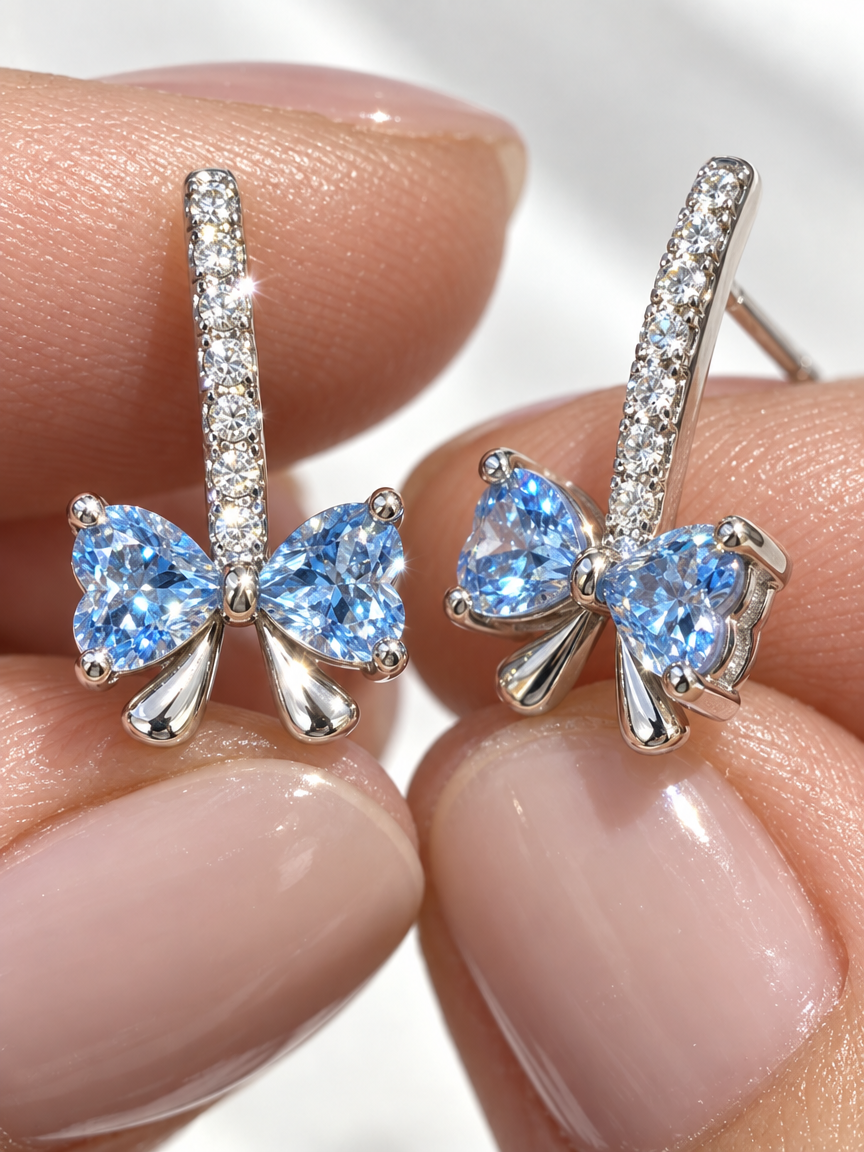 Ocean Heart Bowtie Studs